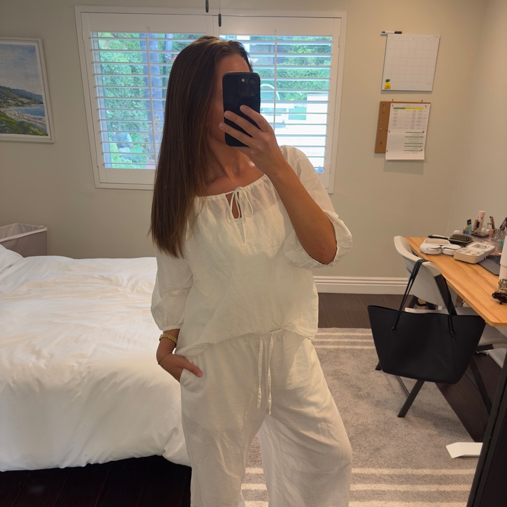 White Linen Blouse from COS with a tie detail in the front.